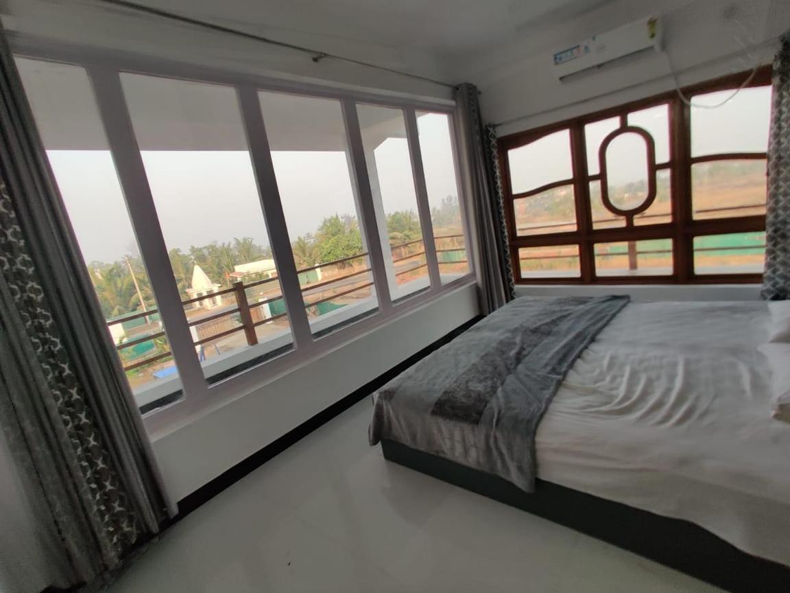 Sunshine Sea View Hotel Alibag Bagian luar foto